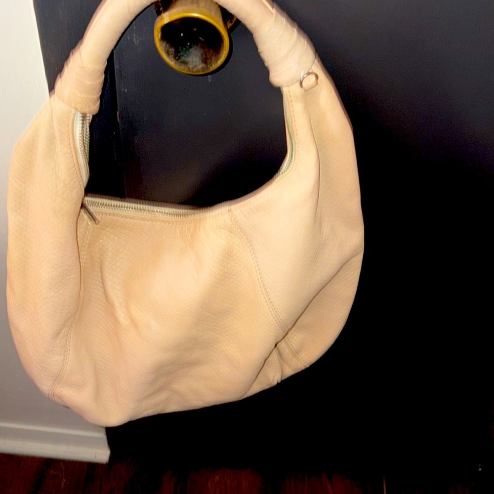 Gently used  pebble leather Michael Kors Cream Hobo bag.